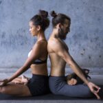 Strengthen emotional bonds while building trust with couples yoga
